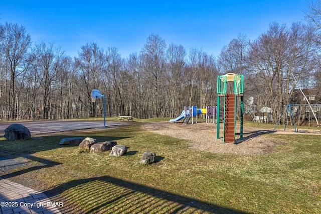 view of jungle gym with a lawn