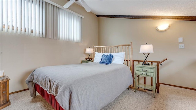 bedroom featuring baseboards and carpet flooring