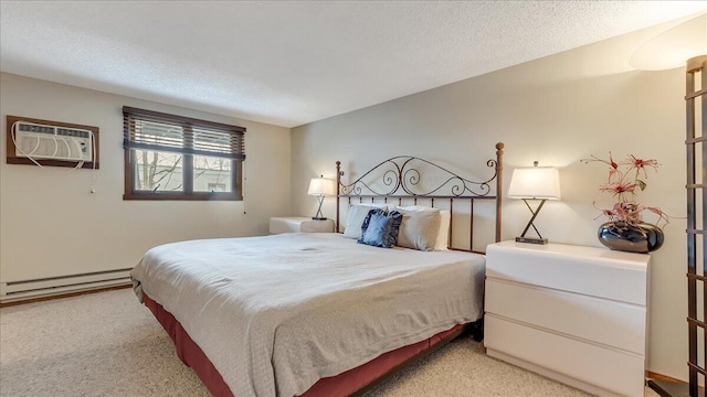 bedroom with a textured ceiling, an AC wall unit, baseboard heating, and light colored carpet