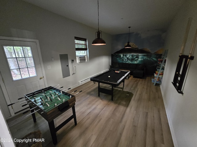 game room with billiards, electric panel, baseboards, and wood finished floors