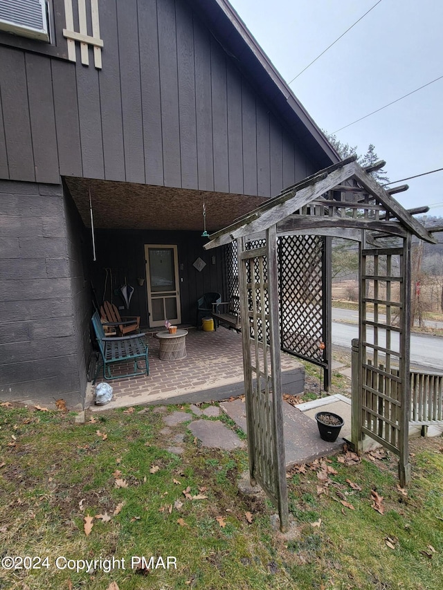 view of patio / terrace with an outdoor fire pit