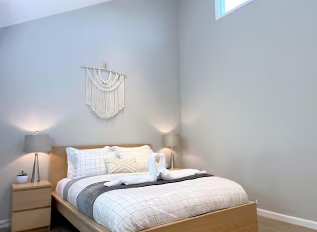 7126 Robinwood Dr, Tobyhanna, PA 18466 - bedroom with wood finished floors and baseboards