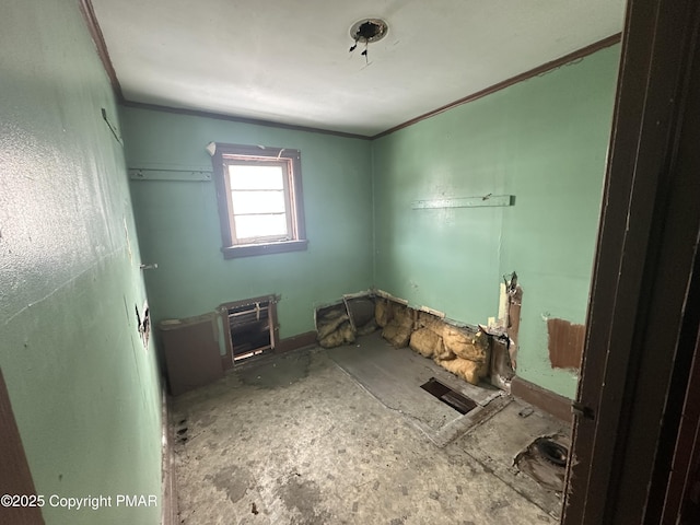 interior space with crown molding