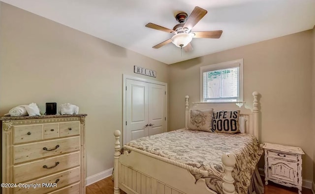 bedroom featuring a ceiling fan and baseboards