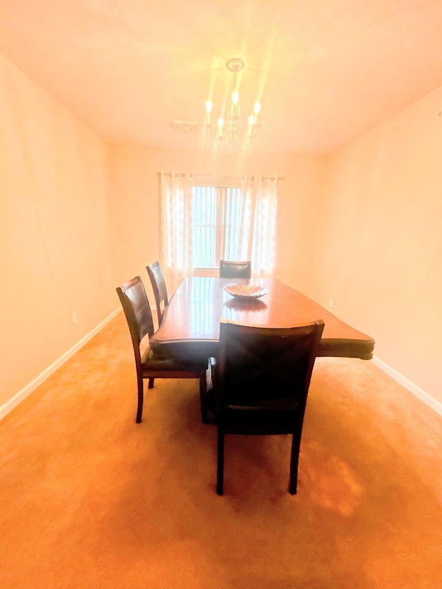 114 Country Ct, Long Pond, PA 18334 - dining area featuring a chandelier and light carpet