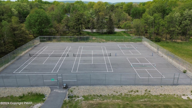 view of sport court with fence