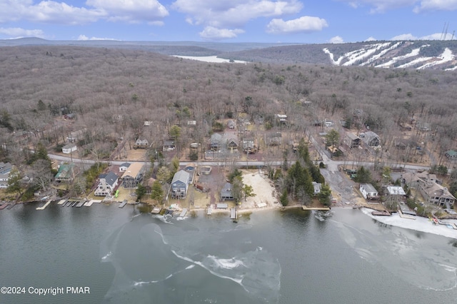 aerial view featuring a residential view and a water view