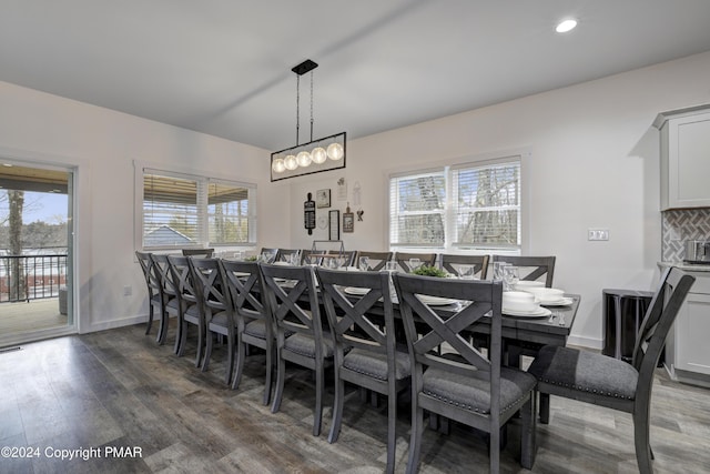 dining space featuring recessed lighting, baseboards, and wood finished floors