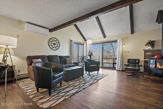 living room with lofted ceiling with beams, baseboard heating, an AC wall unit, a wood stove, and wood finished floors