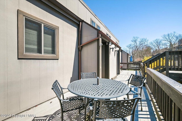 exterior space with outdoor dining area