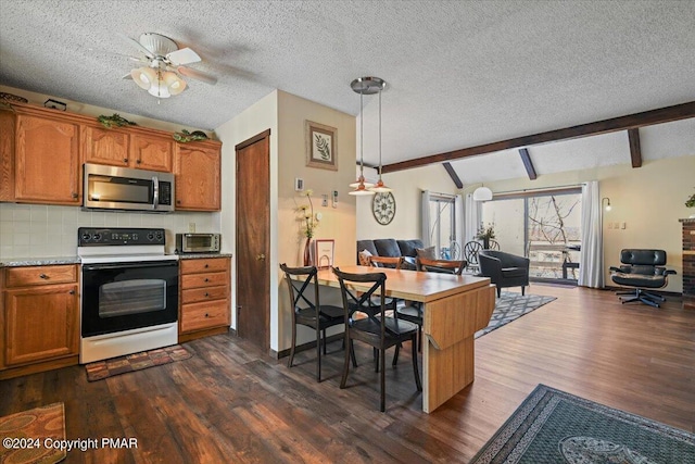 kitchen with open floor plan, range with electric cooktop, stainless steel microwave, and brown cabinets