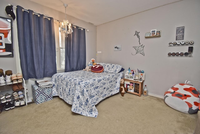 carpeted bedroom with an inviting chandelier and baseboards