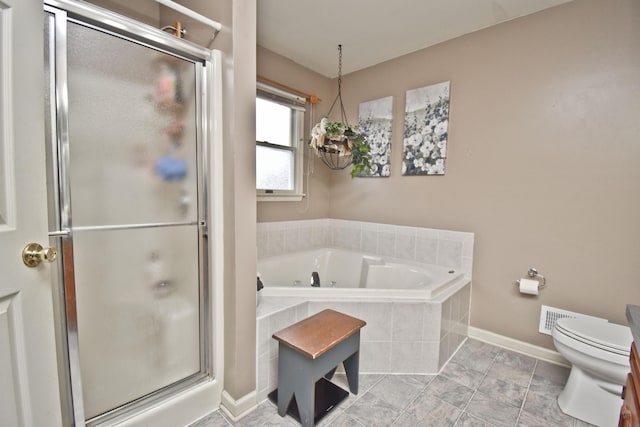full bath featuring a stall shower, toilet, baseboards, visible vents, and a garden tub