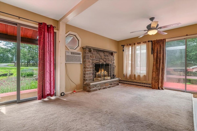250 Sunrise Loop, Henryville, PA 18332 - unfurnished living room with ceiling fan, carpet, a stone fireplace, and a baseboard heating unit
