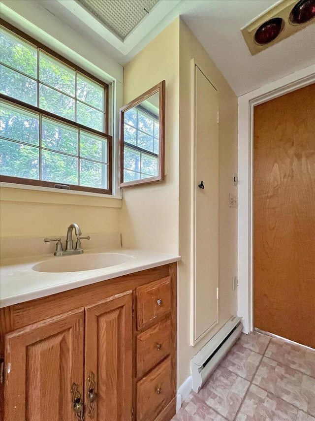 250 Sunrise Loop, Henryville, PA 18332 - bathroom featuring a sink and a baseboard radiator