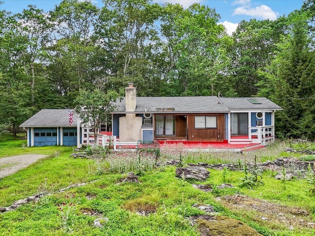 250 Sunrise Loop, Henryville, PA 18332 - view of front of property with a chimney and driveway