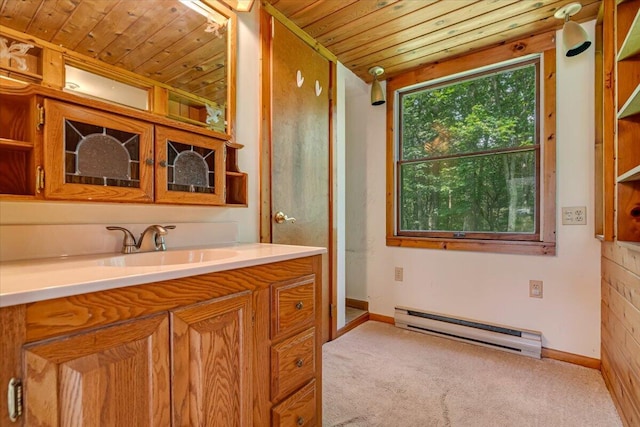 250 Sunrise Loop, Henryville, PA 18332 - bathroom with a baseboard heating unit, wood ceiling, and vanity