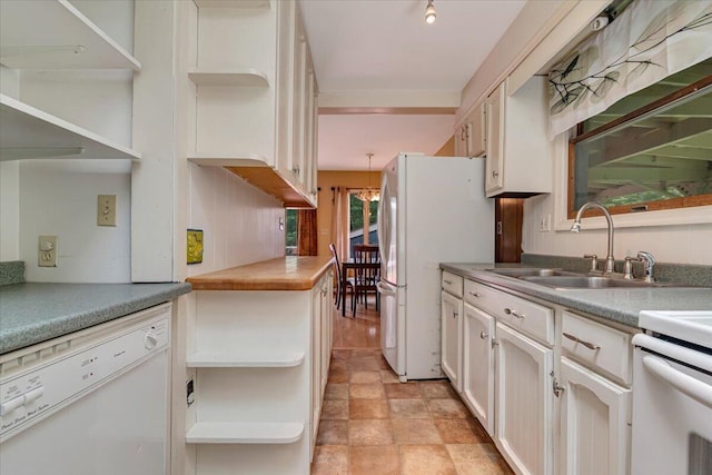 250 Sunrise Loop, Henryville, PA 18332 - kitchen with white appliances, open shelves, white cabinetry, and stone finish floors