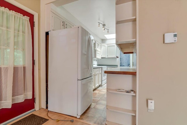 250 Sunrise Loop, Henryville, PA 18332 - kitchen featuring white appliances, open shelves, and white cabinetry
