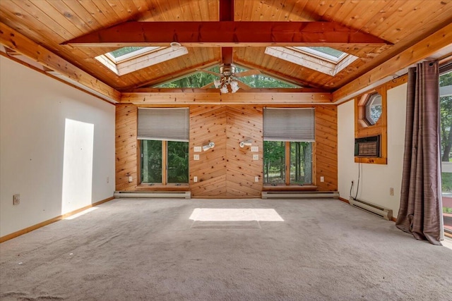 250 Sunrise Loop, Henryville, PA 18332 - empty room featuring a skylight, a baseboard heating unit, wooden ceiling, carpet flooring, and wood walls