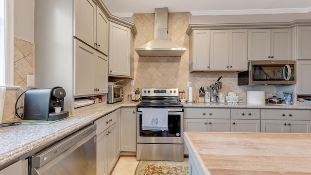141 Old River Rd, Thornhurst, PA 18424 - kitchen with light tile patterned floors, wall chimney range hood, crown molding, stainless steel appliances, and backsplash