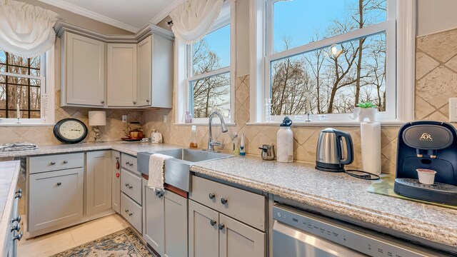 141 Old River Rd, Thornhurst, PA 18424 - kitchen with stainless steel dishwasher, tasteful backsplash, ornamental molding, light countertops, and a sink
