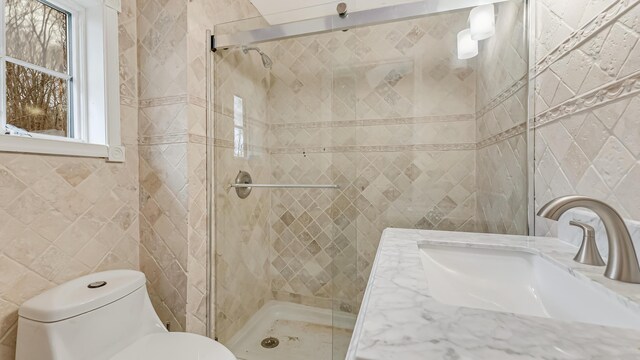 141 Old River Rd, Thornhurst, PA 18424 - bathroom with a sink, tile walls, a stall shower, and toilet