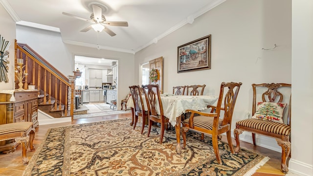 141 Old River Rd, Thornhurst, PA 18424 - dining area with stairs, baseboards, ornamental molding, and a ceiling fan
