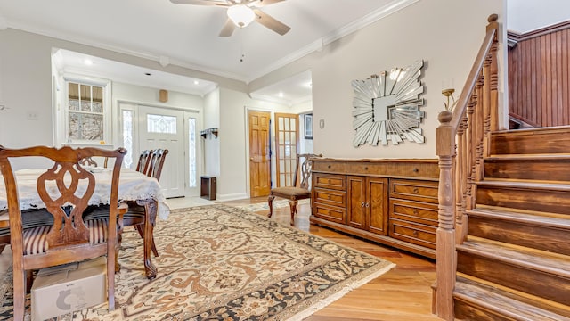 141 Old River Rd, Thornhurst, PA 18424 - dining room with baseboards, ornamental molding, stairway, a ceiling fan, and light wood finished floors