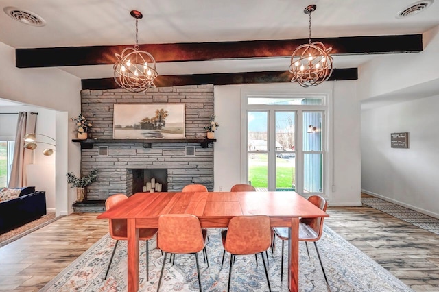 134 Altemose Rd, Pocono Lake, PA 18347 - dining room with visible vents, beam ceiling, and a notable chandelier