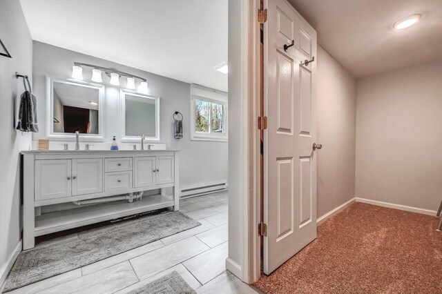 134 Altemose Rd, Pocono Lake, PA 18347 - full bath with double vanity, a sink, baseboards, and baseboard heating