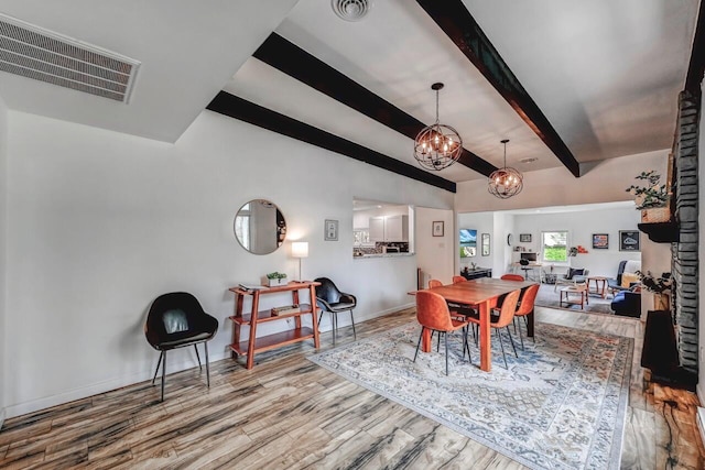 134 Altemose Rd, Pocono Lake, PA 18347 - dining room featuring an inviting chandelier, baseboards, wood finished floors, beamed ceiling, and visible vents