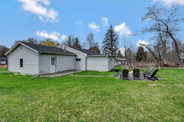 134 Altemose Rd, Pocono Lake, PA 18347 - back of property featuring a lawn and a shingled roof