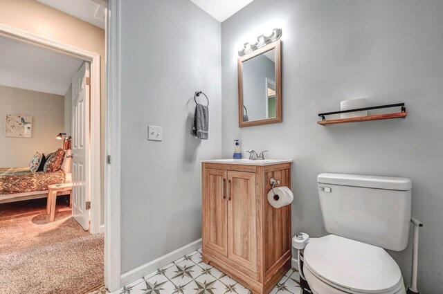 134 Altemose Rd, Pocono Lake, PA 18347 - bathroom featuring baseboards, toilet, and vanity
