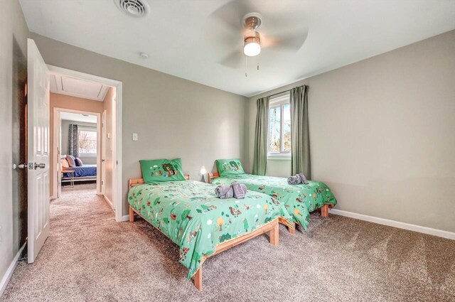 134 Altemose Rd, Pocono Lake, PA 18347 - bedroom featuring carpet, multiple windows, and attic access
