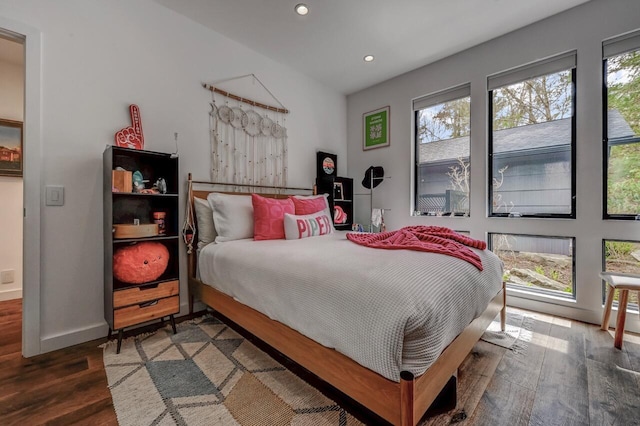 bedroom featuring recessed lighting, baseboards, and wood finished floors