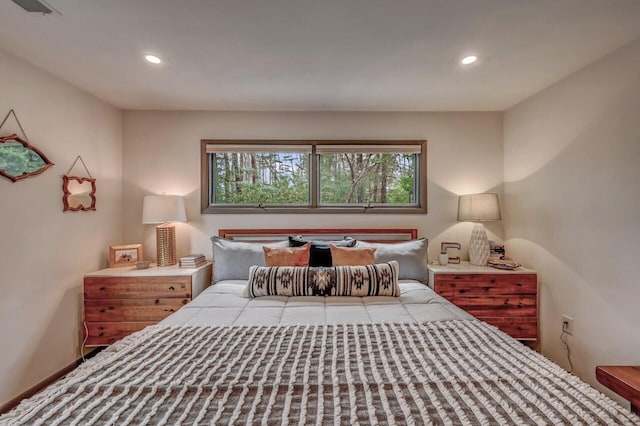 bedroom featuring recessed lighting