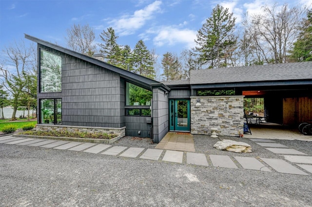 view of front facade with stone siding