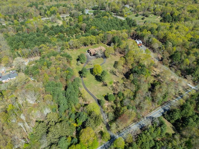 bird's eye view featuring a forest view