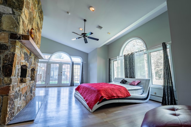 bedroom with access to exterior, multiple windows, french doors, and visible vents