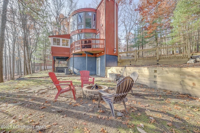 123 Shannon Ct, Bushkill, PA 18324 - back of house with a fire pit and a wooden deck