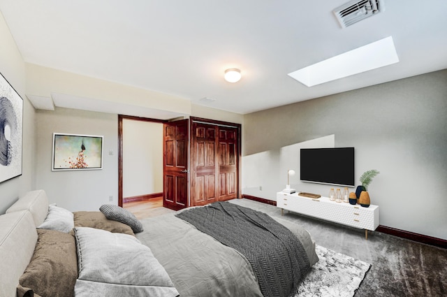 374 Packer Dr, Weatherly, PA 18255 - carpeted bedroom with visible vents, a skylight, a closet, and baseboards