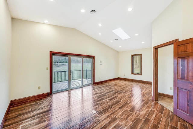 374 Packer Dr, Weatherly, PA 18255 - spare room with a skylight, baseboards, dark wood-style floors, and visible vents