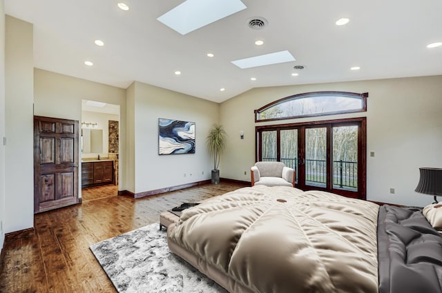 374 Packer Dr, Weatherly, PA 18255 - bedroom with vaulted ceiling with skylight, recessed lighting, access to outside, and wood finished floors