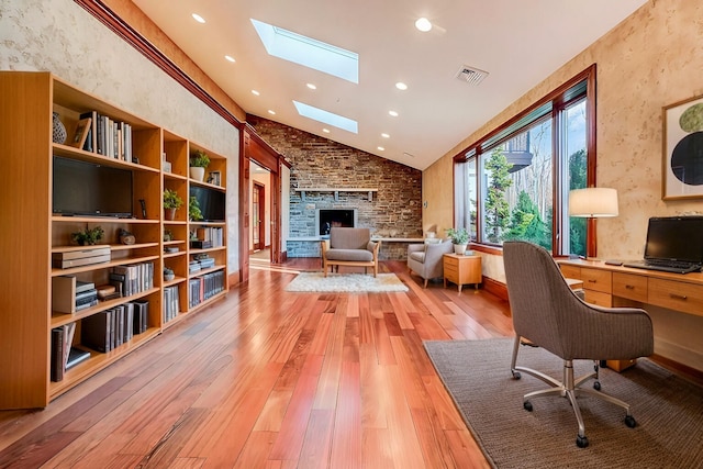 374 Packer Dr, Weatherly, PA 18255 - office with visible vents, light wood-type flooring, a fireplace, recessed lighting, and a skylight