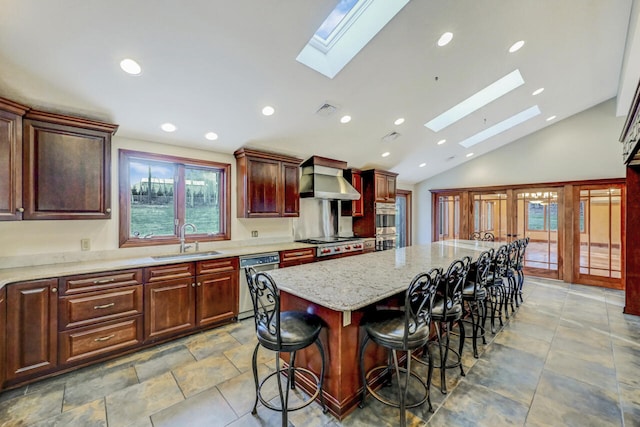 374 Packer Dr, Weatherly, PA 18255 - kitchen with visible vents, a center island, a sink, appliances with stainless steel finishes, and a skylight