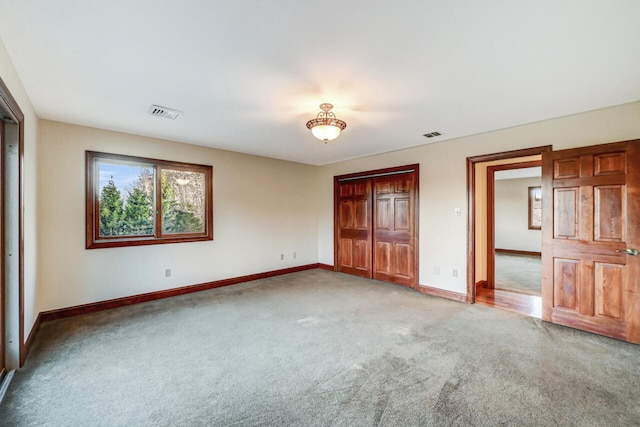 374 Packer Dr, Weatherly, PA 18255 - unfurnished bedroom with a closet, carpet flooring, visible vents, and baseboards