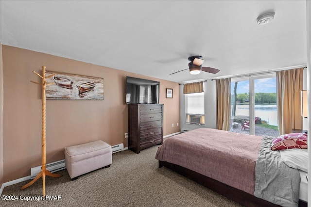 bedroom featuring a baseboard heating unit, ceiling fan, carpet floors, and baseboards