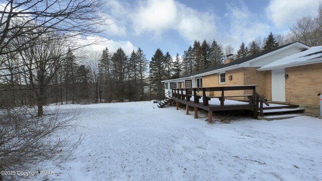 exterior space with a wooden deck