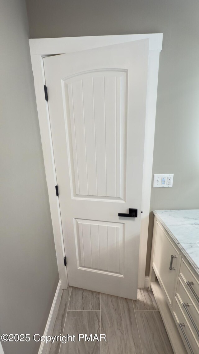 unfurnished bedroom with ceiling fan, carpet, and baseboard heating